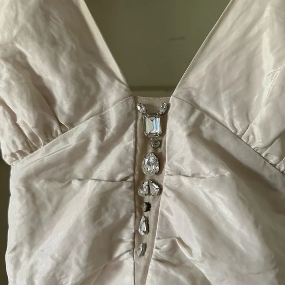 This is a Nicole Miller wedding dress, size 10. It wants to get married again! - Picture 11 of 17